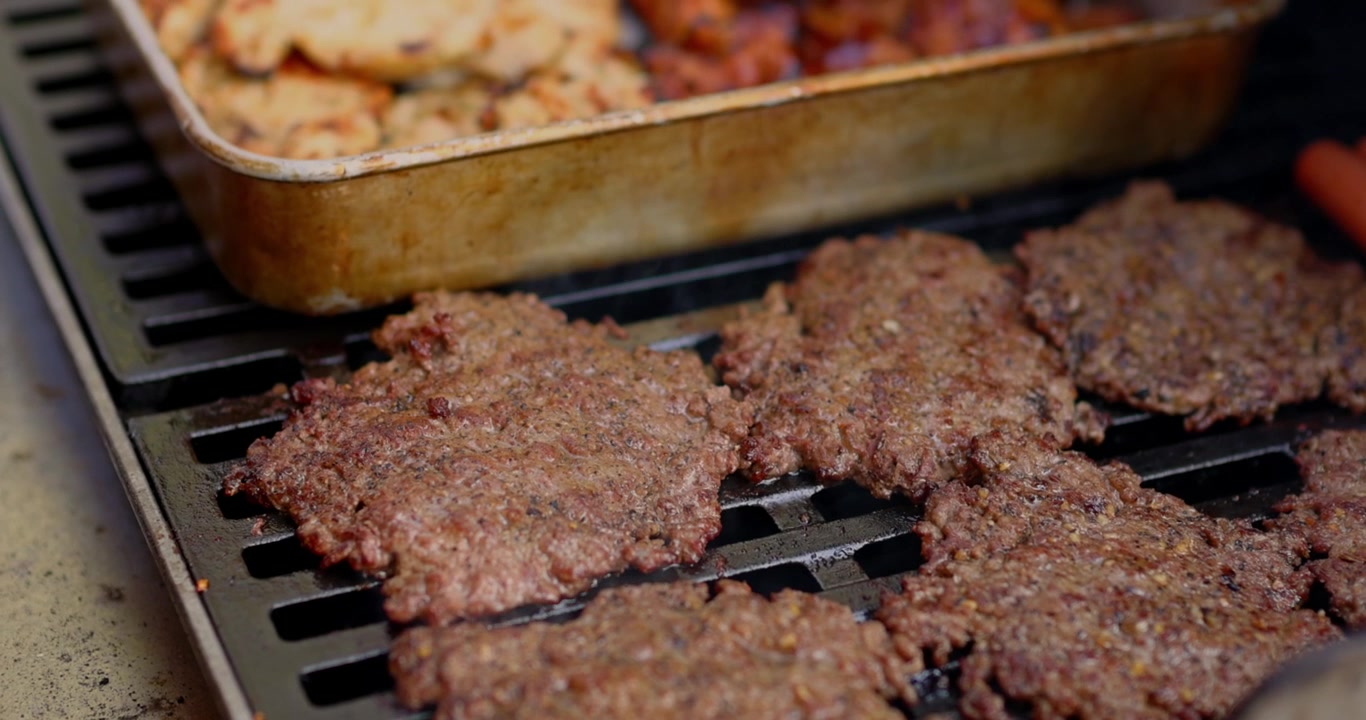 4th of July Barbecue Cooking Grilling Meat Chicken Beef Hamburgers Hot Dogs in Celebration of America USA 250th Birthday - in Cinema 4K 30fps Slowed From 120fps