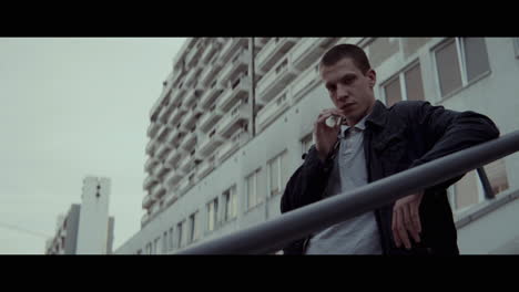 young man smoking in the city