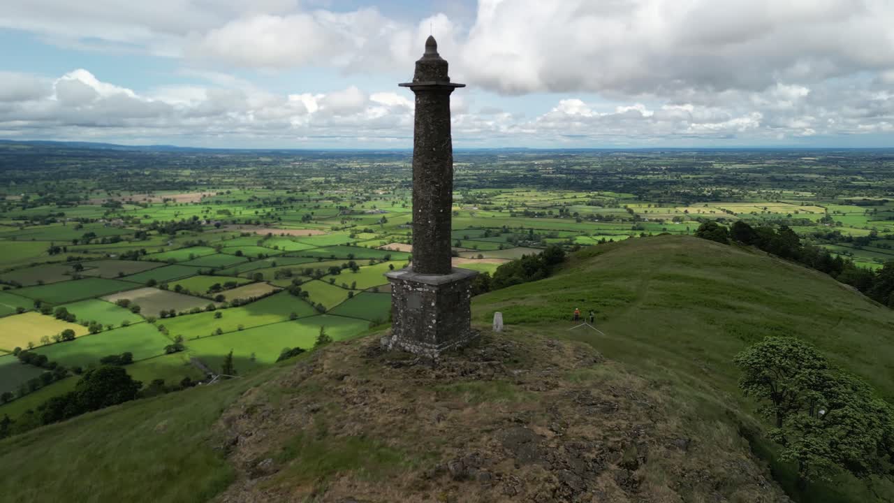 This historic Admiral Rodney’s Pillar, Montgomeryshire, UK - Drone aerial rotate on a typical British summer’s afternoon