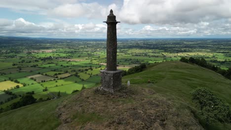 this historic admiral rodney’s pillar, montgomeryshire, uk - drone aerial rotate on a typical british summer’s afternoon