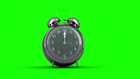 Alarm-clock-ringing-on-green-background