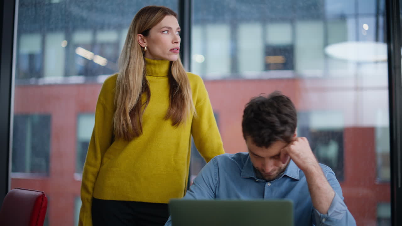 Frustrated coworkers reacting failure emotionally looking laptop screen closeup