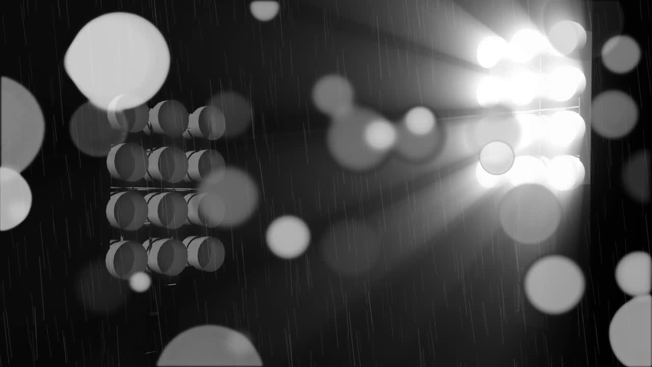 manchas brillantes de luz sobre focos contra un fondo negro