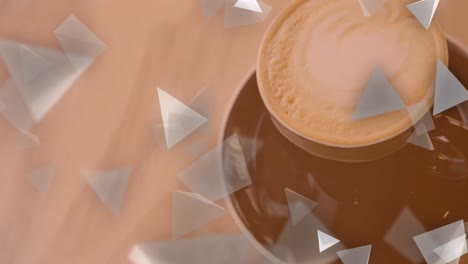 animación de formas sobre una taza de café