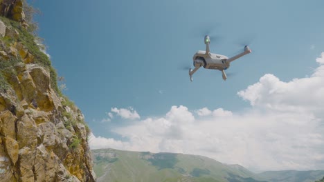 drone flying over mountains