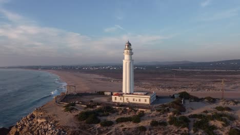 Lighthouse-on-cape-near-sea