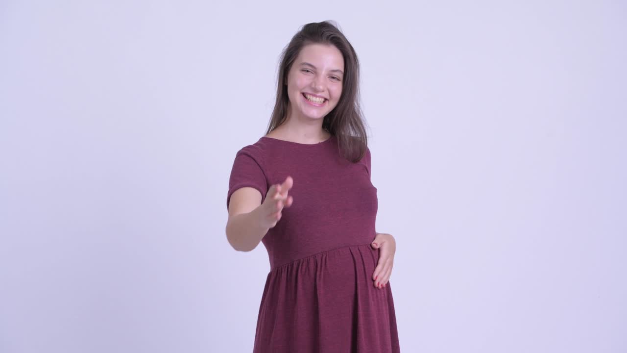 feliz joven hermosa mujer embarazada