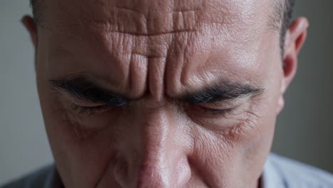 close-up of a man's concerned expression