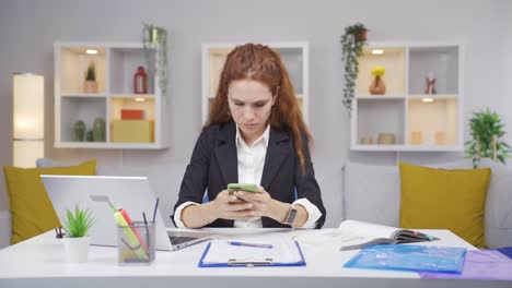 home office worker woman having problems and stress on the phone.