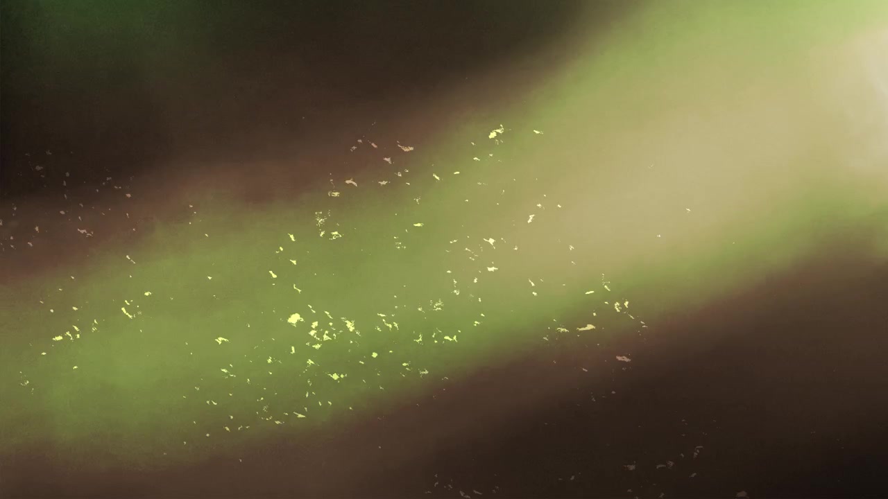 Fughe di luce verde astratte e particelle su sfondo nero