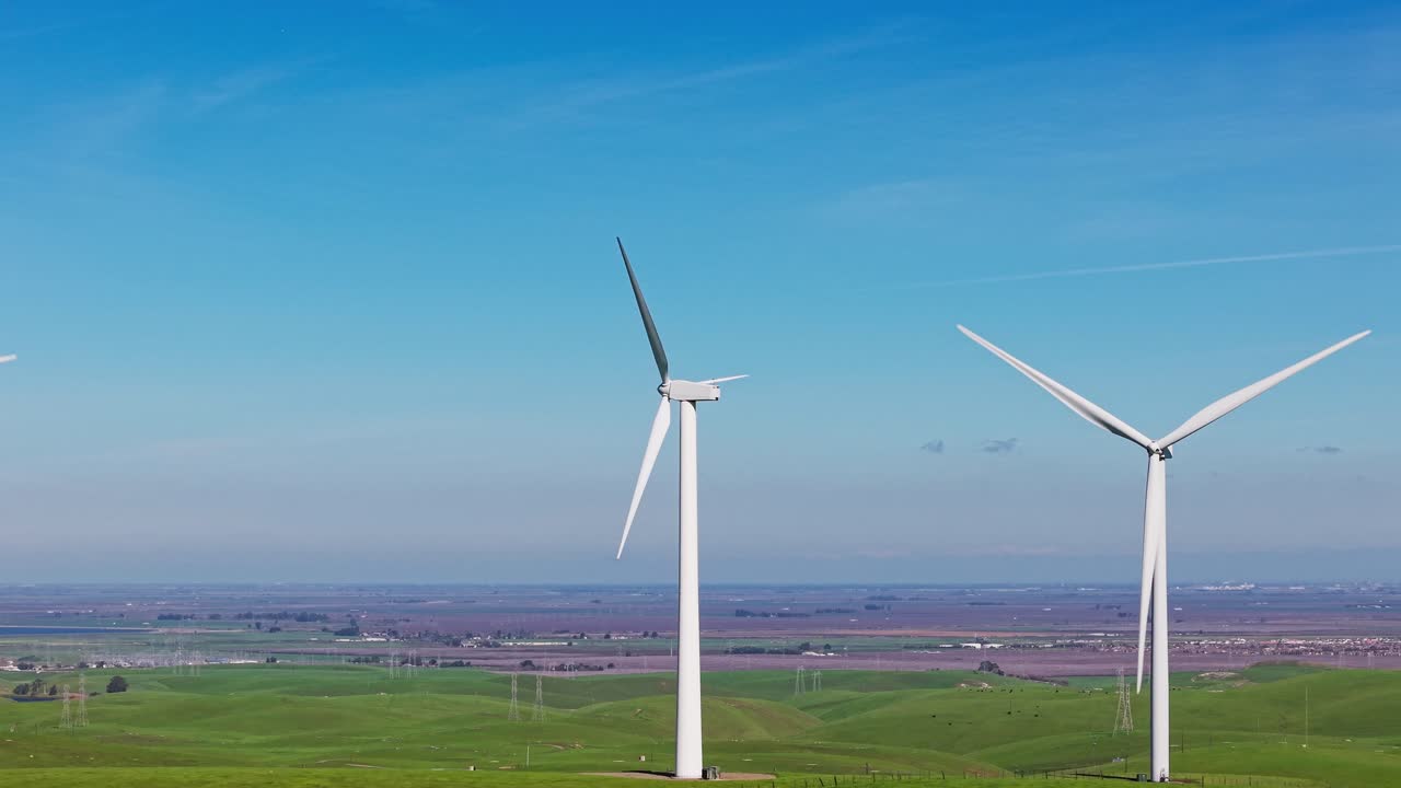 Close up drone view of the wind farms near Altamont Pass as they form a striking grid across the hills of Dublin California