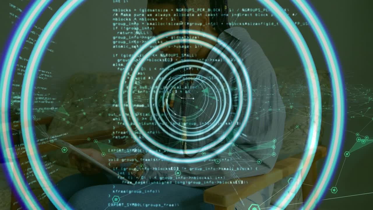 Animation of data processing and neon circles over african american businesswoman using tablet
