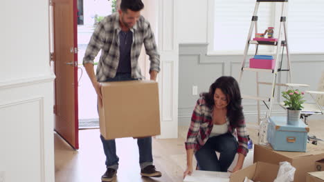 hispanic family moving into new home shot on r3d