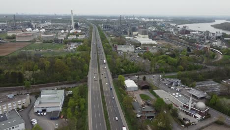 cars go super fast while drive on highway called german autobahn next to city and mosque