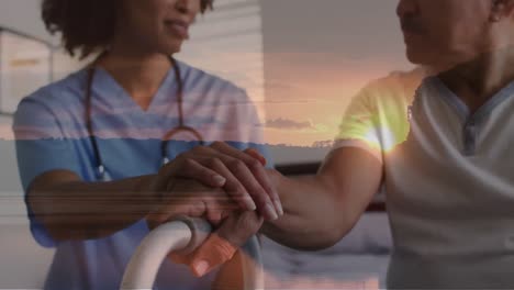 Animation-of-landscape-over-diverse-doctor-and-patient-talking-and-holding-hand