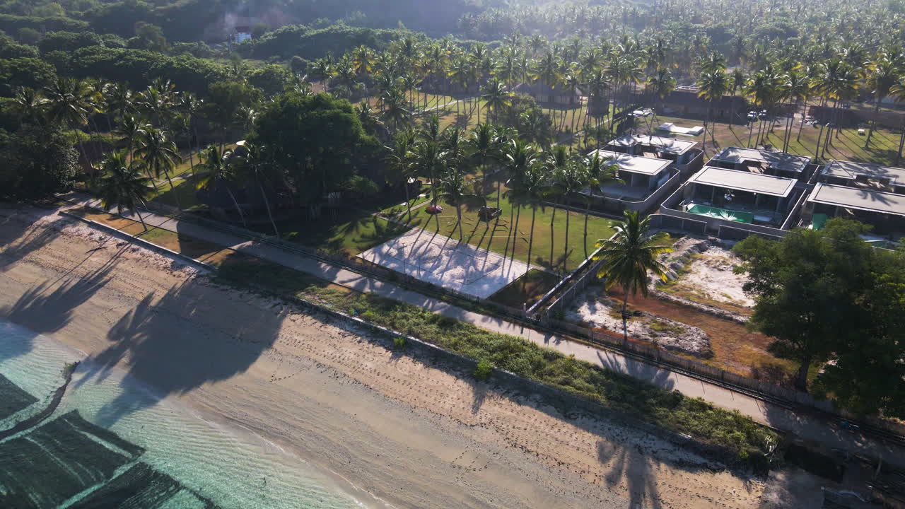 Aerial View of Luxury Beach Resort with Palm Trees