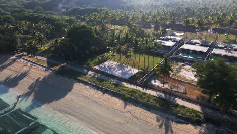 aerial view of luxury beach resort with palm trees