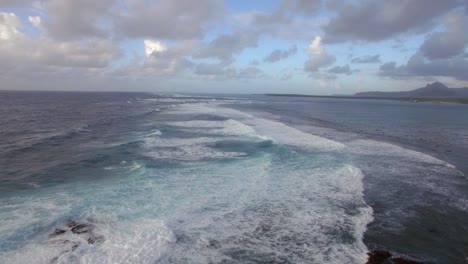 foamy waves of indian ocean aerial view