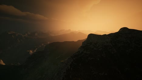 High-mountain-peaks-covered-with-dramatic-heavy-fog