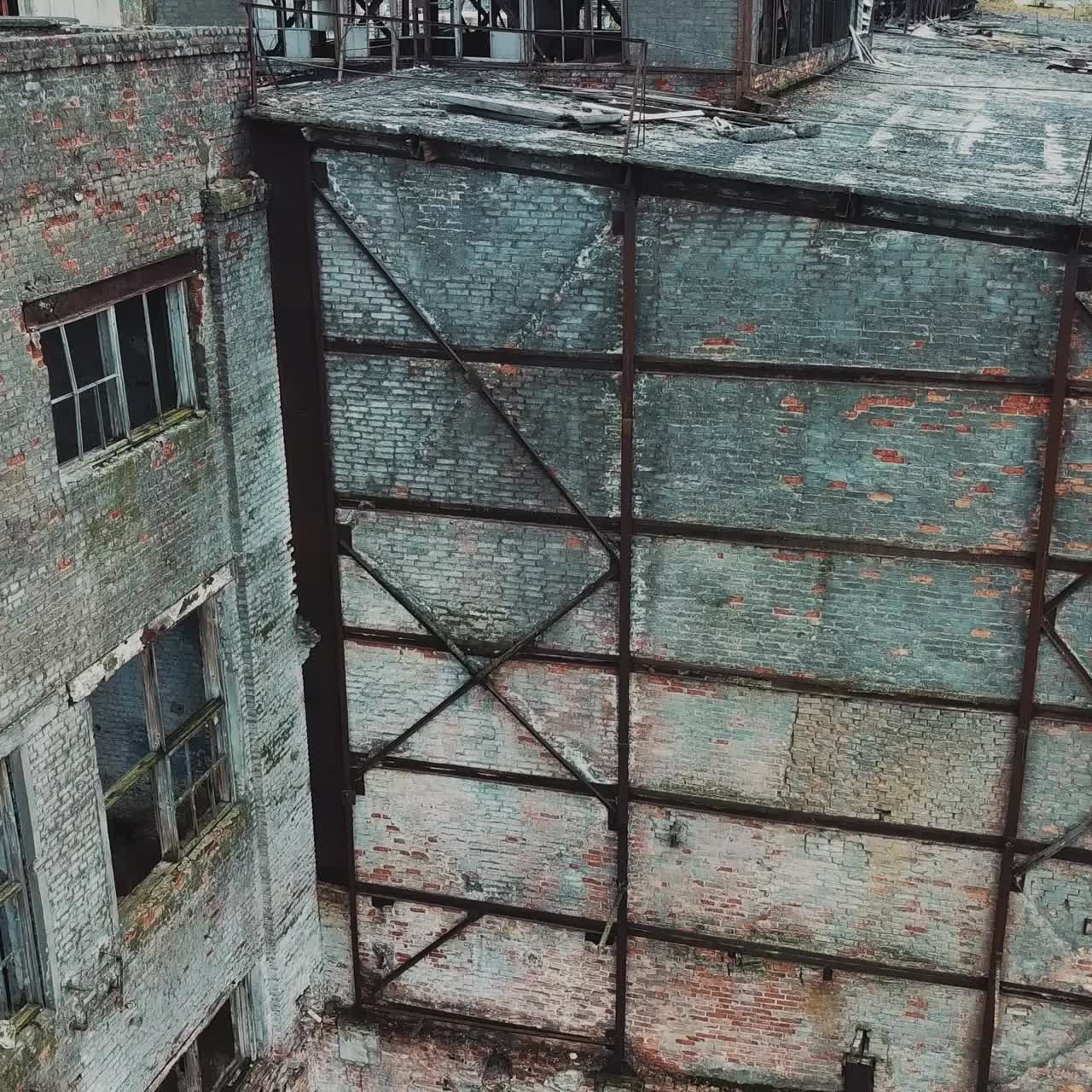 Flight over the destroyed factory. Old industrial building for demolition.
