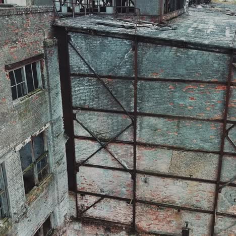 flight over the destroyed factory. old industrial building for demolition.