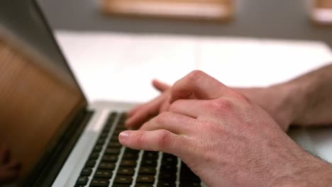 Businessman-working-on-laptop