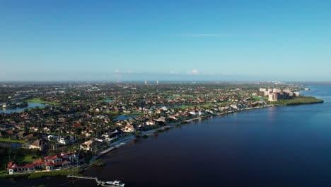 Drone-aerial-view-of-mansion-homes-on-the-coastline-of-southern-Florida