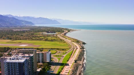 Cityscape-of-Batumi-nearby-Black-sea-expanse-and-mountain-range-of-Turkey