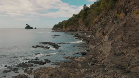 rugged coastal landscape and ocean in costa rica in summer - aerial drone shot