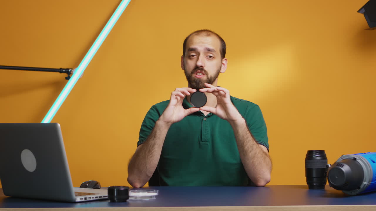 Photographer holding nd filter
