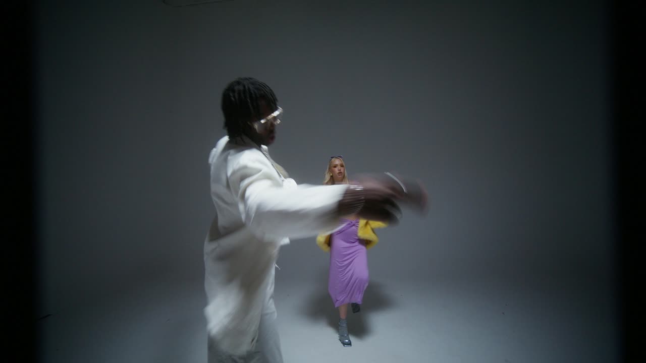 Fashion Model in Yellow Fur Coat and Purple Dress