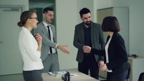 business colleagues celebrating agreement