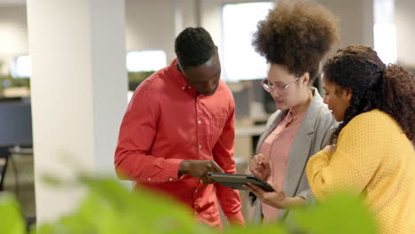 casual diverse businesspeople talking in office, slow motion with copy space