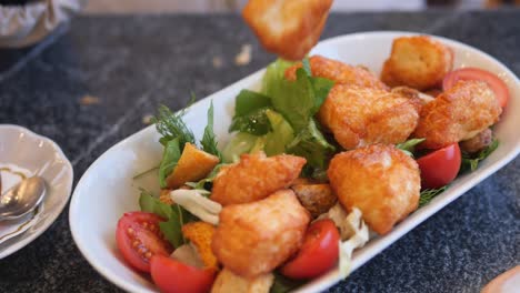 delicious salad with crispy cheese