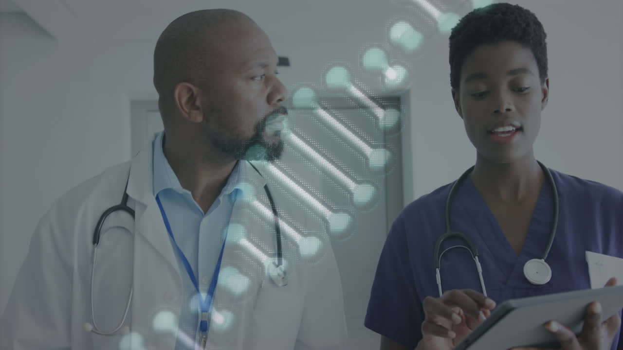 Animation of dna strand over african american female and male doctor with tablet talking in hospital