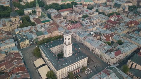 Aerial-drone-video-of-european-city-Lviv,-Ukraine.-Rynok-Square,-Central-Town-Hall,-Dominican-Church