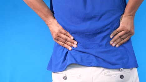 man experiencing back pain