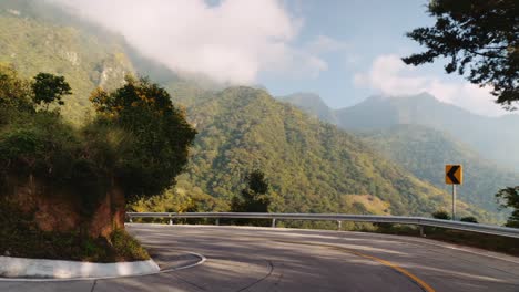 slow motion sunset drive through the mountains of guatemala, on the road leading to san marcos la laguna in lake atitlan