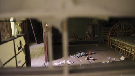 Ruined-Abandoned-House-in-Japan,-Looking-Through-Ripped-Doors