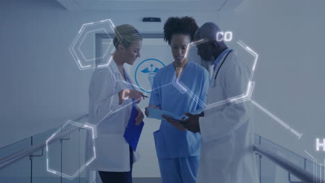 animation of chemical formula over diverse surgeons discussing work