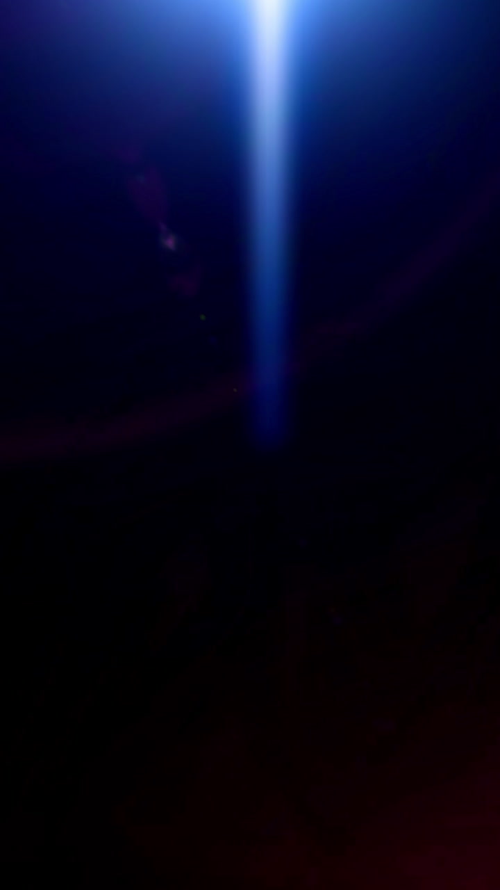 Abstract Optical Lens Flares and Light Leaks on Dark Background