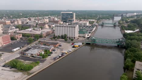 bridges along des plaines river in joliet, illinois with drone video pulling back