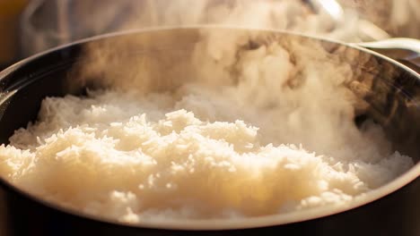 steaming rice in a pot
