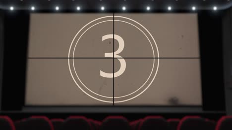 film countdown on the cinema screen in the movie theater without audience