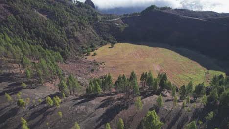 Caldera-de-Los-Marteles-from-the-air:-aerial-view-in-orbit-over-the-famous-caldera-and-its-pine-forests-on-the-island-of-Gran-Canaria