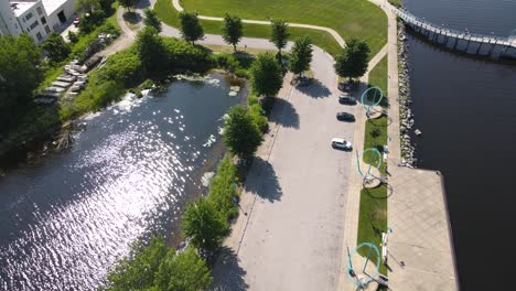 low flyover of heritage landing near american flag