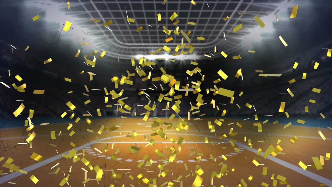 농구장 전망에 반하여 떨어지는 황금색 콘페티의 애니메이션