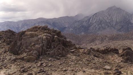 aerial drone sweeping past the alabama hills of california's sierra nevada mountain range