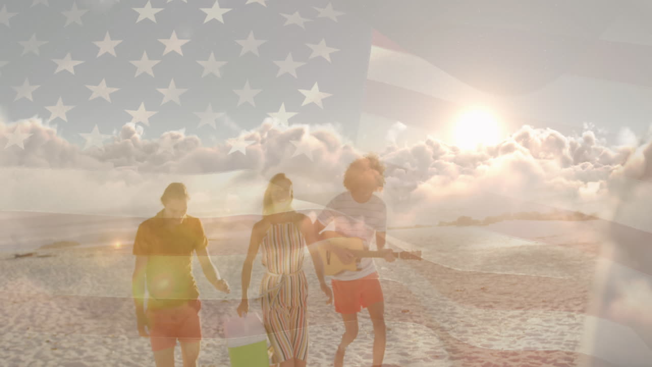 Animation of flag of united states of america over happy diverse friends on beach