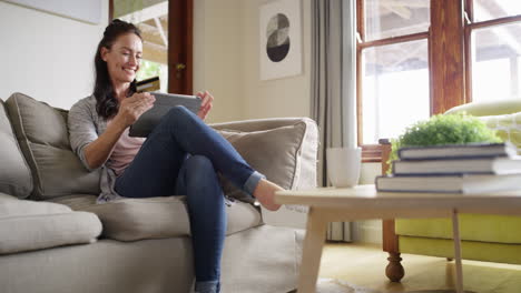 a young couple using a digital tablet